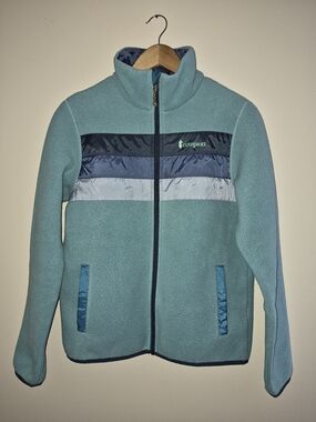 Cotopaxi Teal Fleece Jacket with Navy Chest Stripes